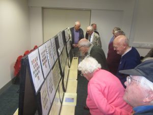 NPS Members inspecting the displays